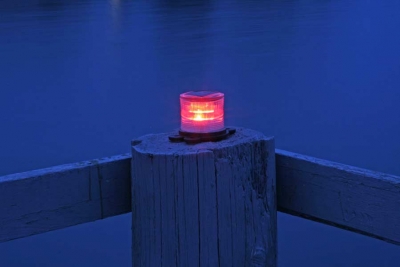 Picture of red marine solar light at night.