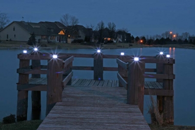 Picture at night of an installation with several marine solar lights.