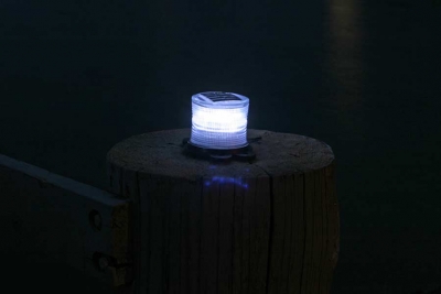 Closeup picture of clear marine solar light at night.