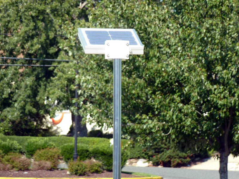 Rear view of the overhead solar dock light, showing solar panels.