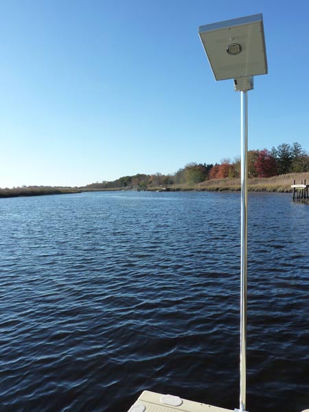 Picture of the overhead solar dock light and mounting pole.