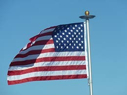 picture of American flag on flagpole with solar light